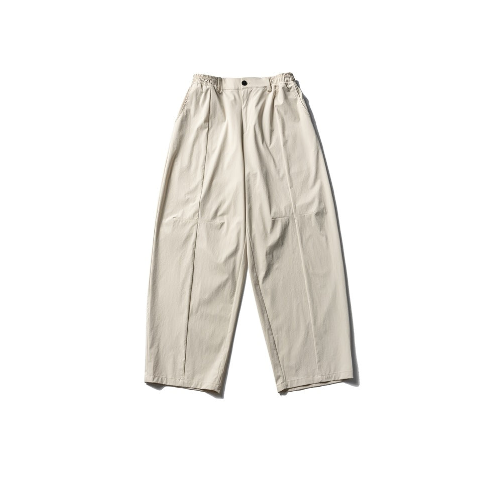 Beige wide-leg pants with elastic waistband and center button, flat lay front view