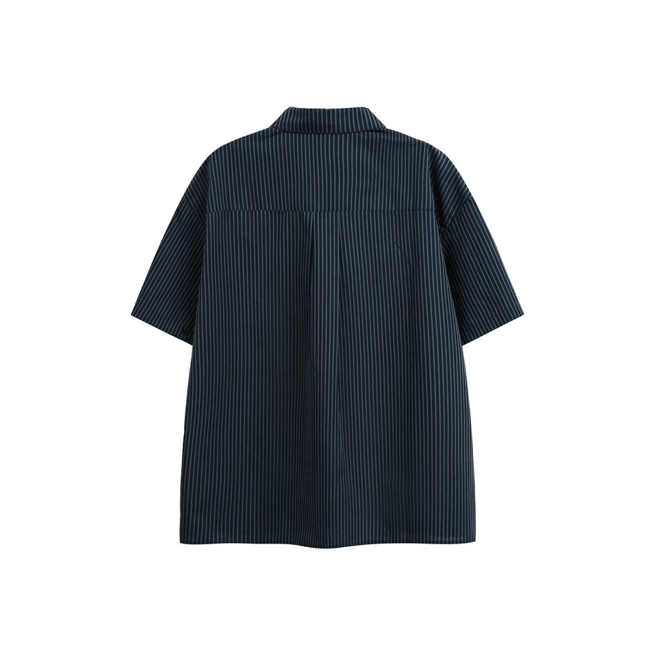 Back view of a black short-sleeve shirt with narrow blue-gray vertical pinstripes and a yoke seam.