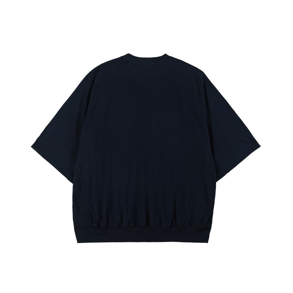 Navy blue oversized raglan-sleeve tee with ribbed hem, flat lay, apparent back view