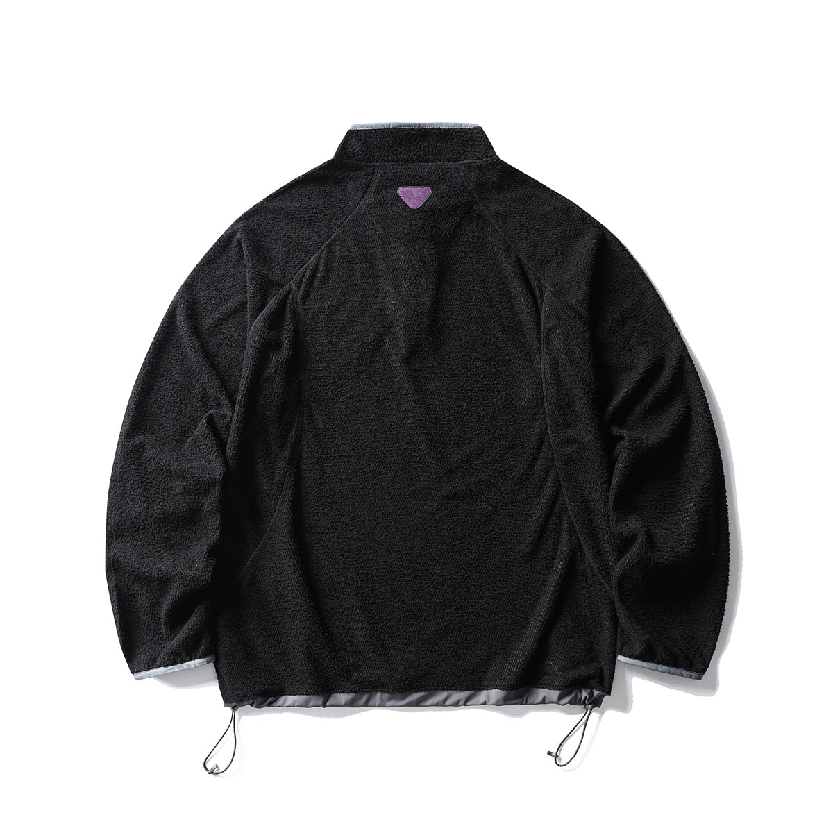 Back view of a black fleece pullover with a raised collar, curved seam lines, and adjustable hem cords.