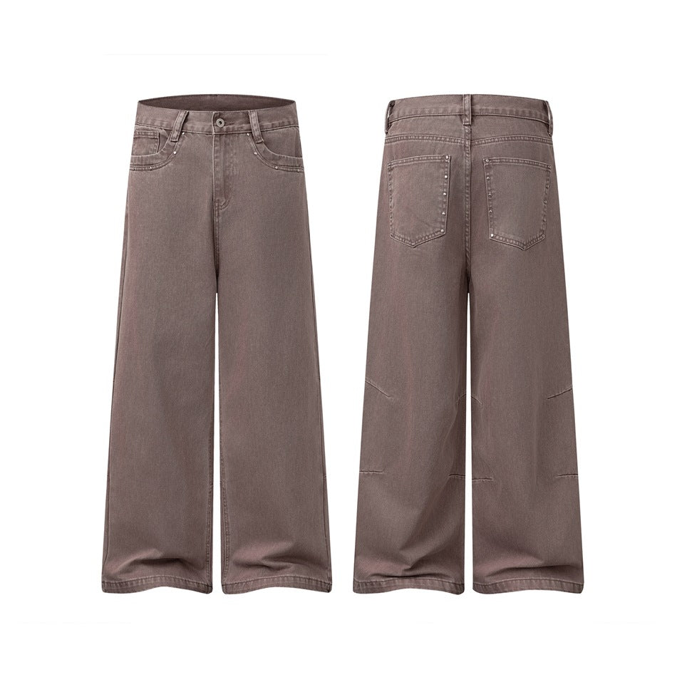 Dusty taupe wide-leg jeans shown from the front and back, with stud-trimmed pockets and seam details.