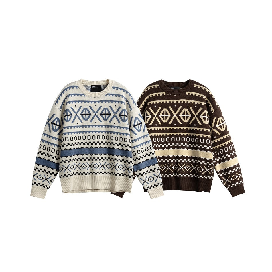 Two crew-neck patterned sweaters shown from the front: one ivory with blue and black motifs, one brown with cream motifs.