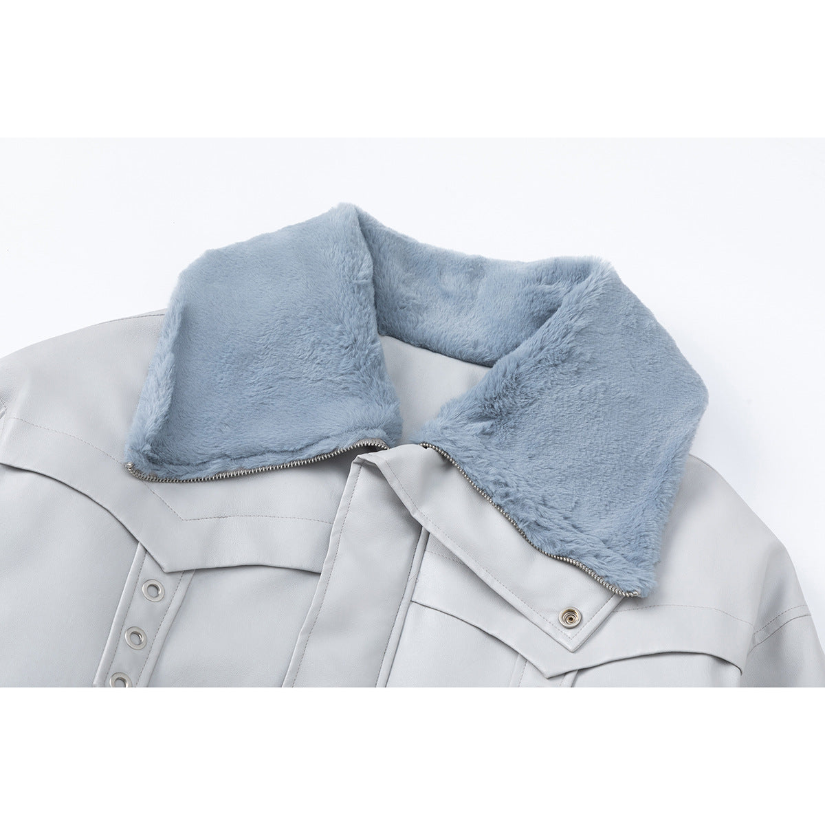 Close-up of a pale gray jacket with a wide, soft blue collar and metal zipper.