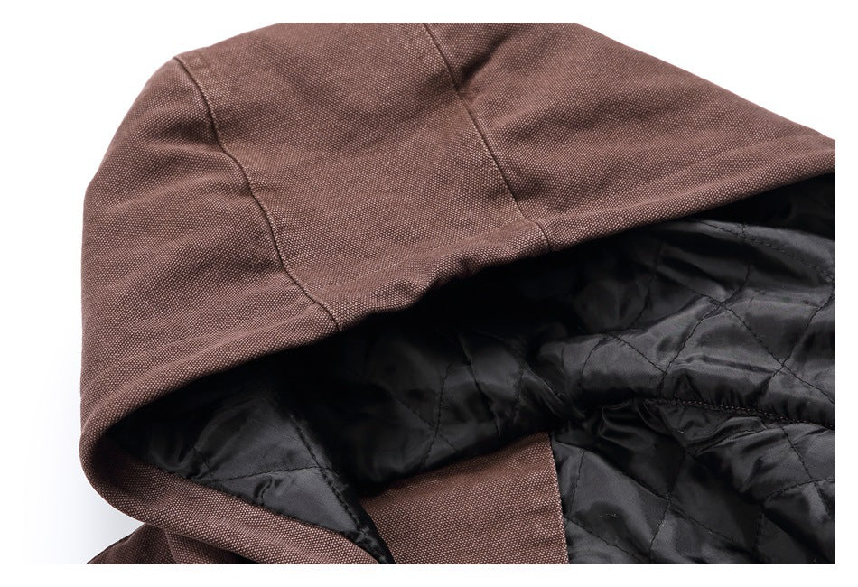 Close-up of the brown jacket's hood and black quilted lining.