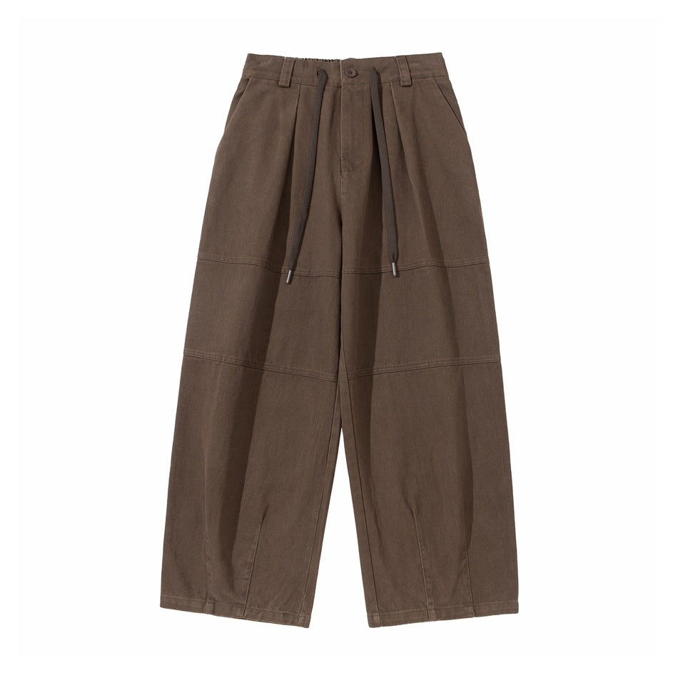 Brown wide-leg pants, front flat lay, with pleats, drawstring waist and horizontal seams
