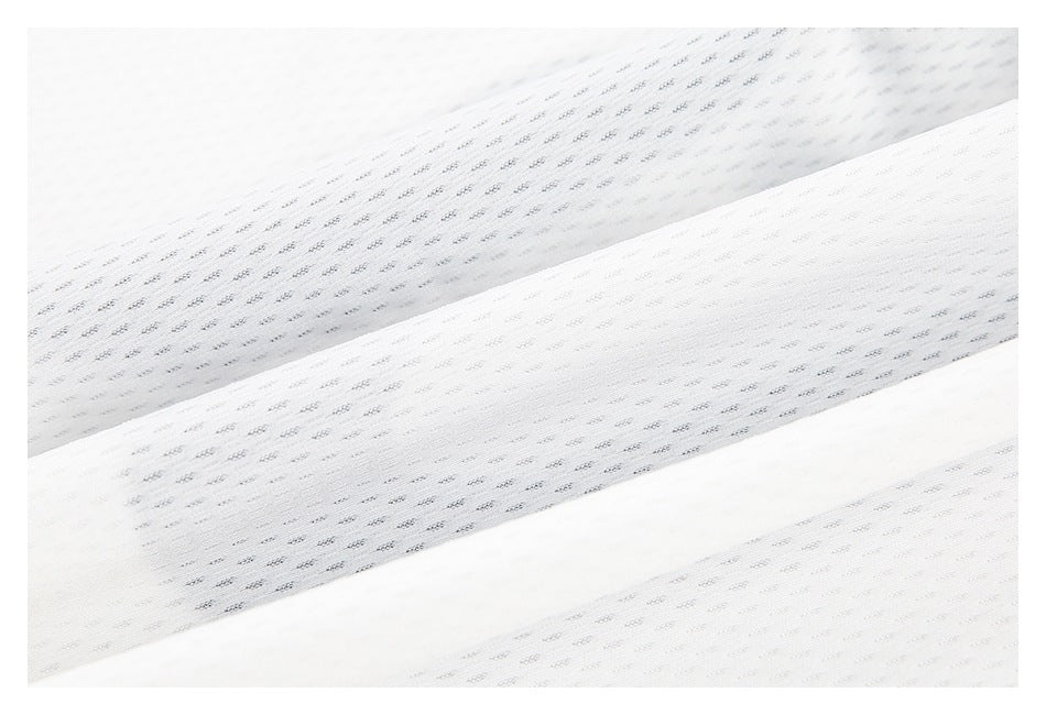 Close-up of layered white mesh fabric showing the textured weave from different angles.
