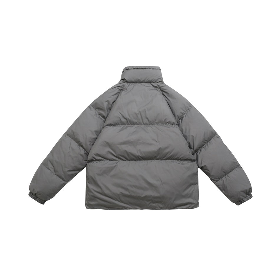 Back view of a gray quilted puffer jacket with a stand collar, horizontal baffles and elastic cuffs.