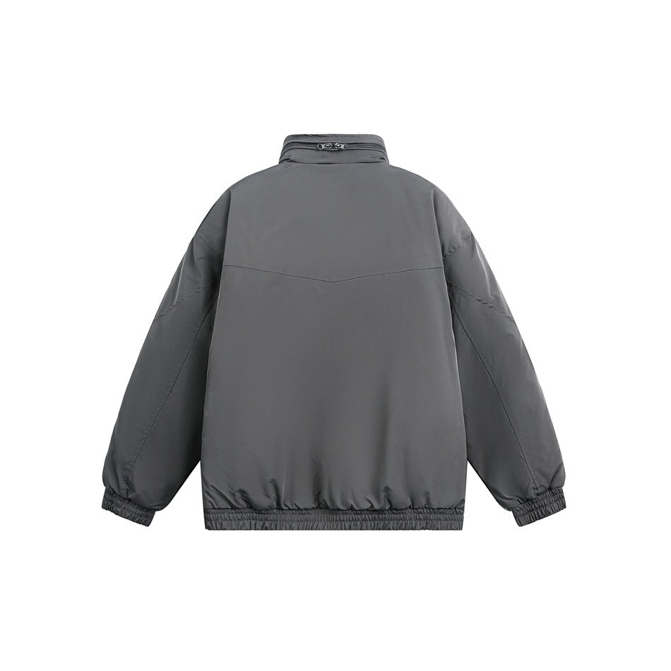 Back view of a charcoal gray jacket with a high collar, long sleeves, and elasticated cuffs and hem.