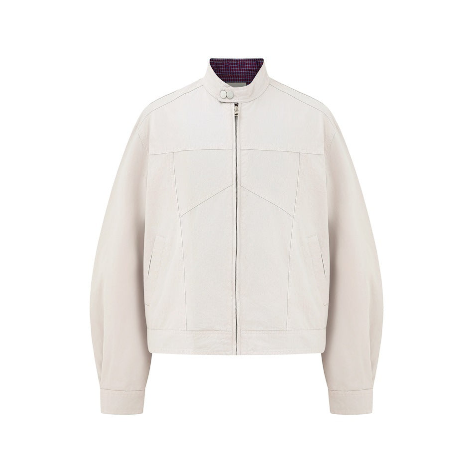 Off-white stand-collar zip jacket with paneled front, snap collar tab and checked collar interior, flat front view