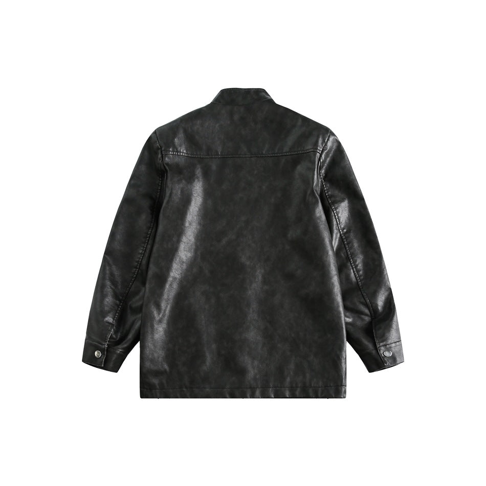 Back view of a black mottled jacket with a stand collar, long sleeves, and snap cuffs.