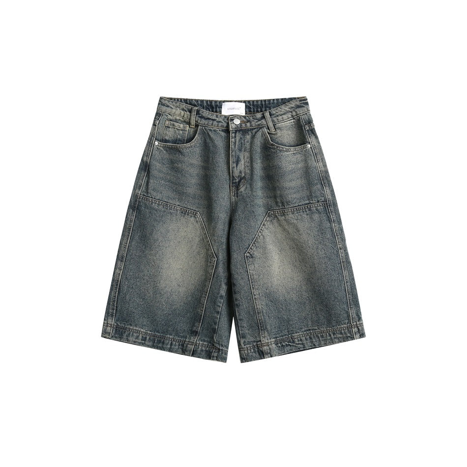 Faded blue-green knee-length denim shorts with front panel seams, pockets and zip fly, flat front view