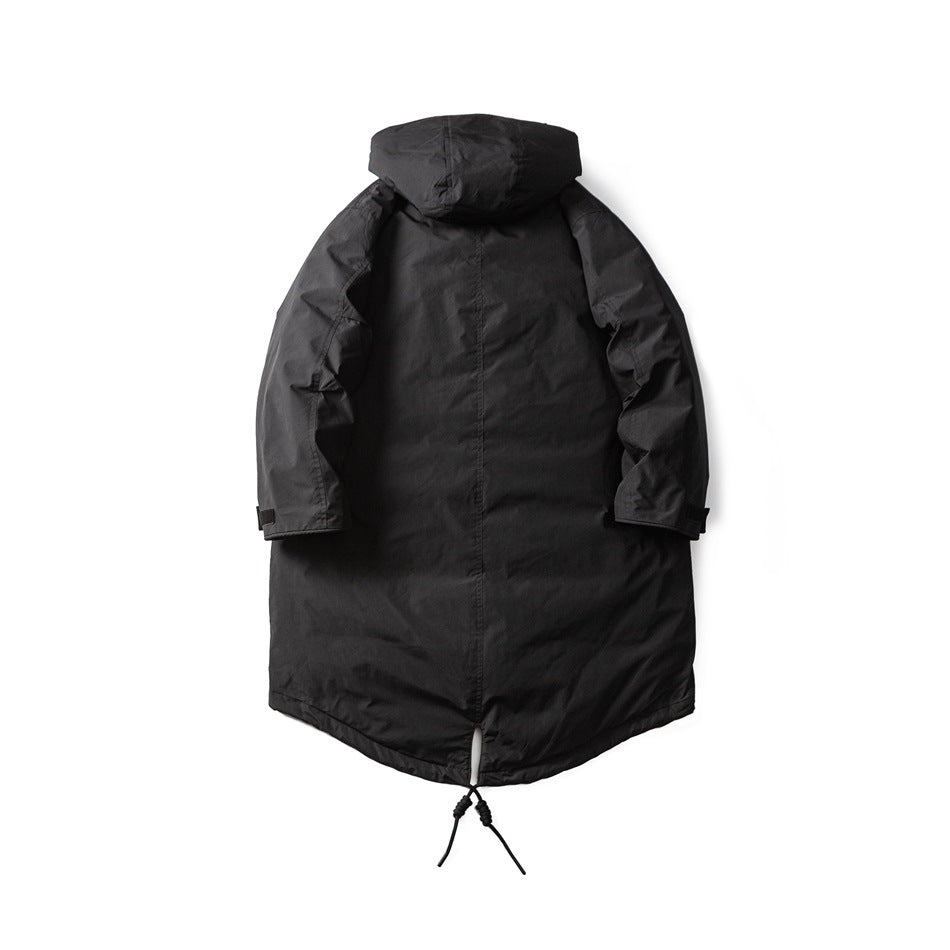 Back view of a black long hooded parka laid flat, with adjustable cuffs and a drawcord hem.