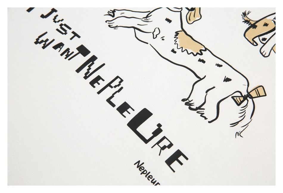 Detail of a white shirt's cartoon dog print and bold English lettering.