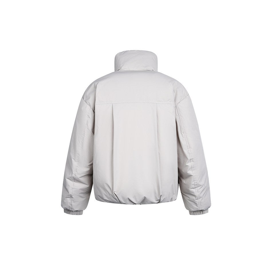 Back view of a pale gray padded jacket with a tall stand collar, long sleeves, elastic cuffs, and a gathered hem.