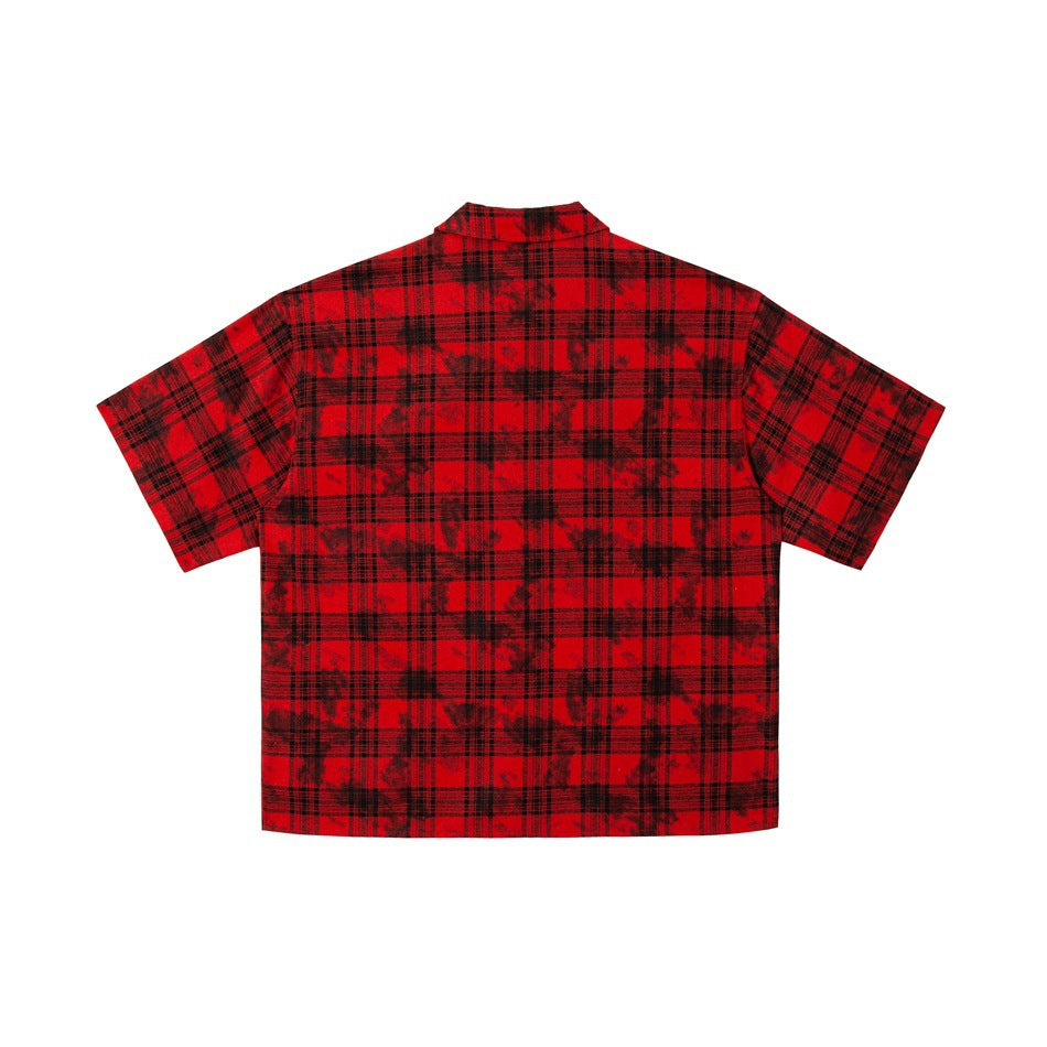 Back view of a red-and-black plaid short-sleeve button-up shirt on a white background.