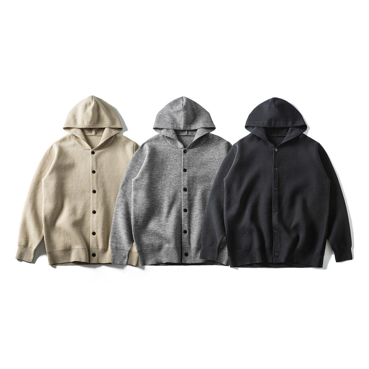 Three button-front hooded knit cardigans shown from the front in beige, heather gray, and charcoal.