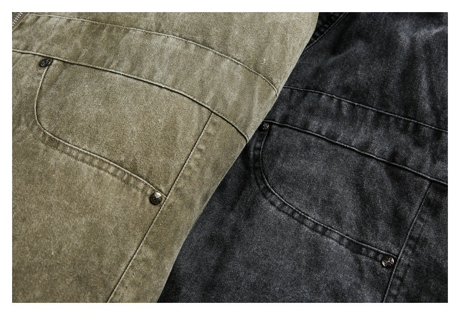 Close-up of curved buttoned pockets on olive-brown and charcoal jackets.