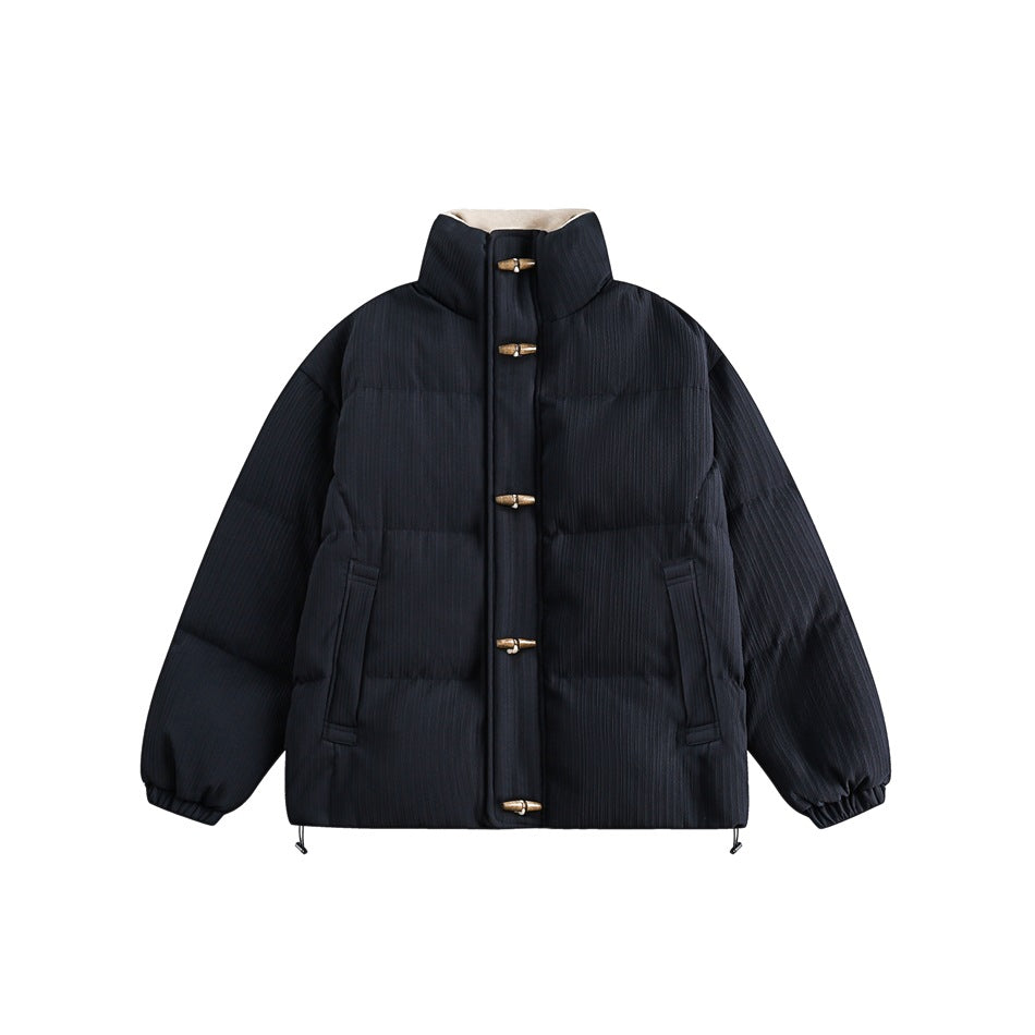 Front view of a dark navy quilted jacket with a high stand collar, five toggle fasteners and two pockets.