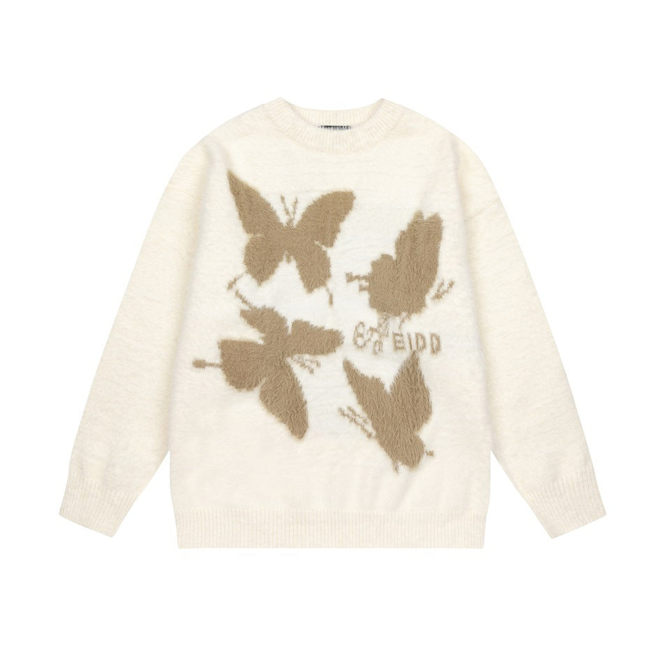Beige crew-neck knit sweater flat lay with four fuzzy tan butterflies on the front