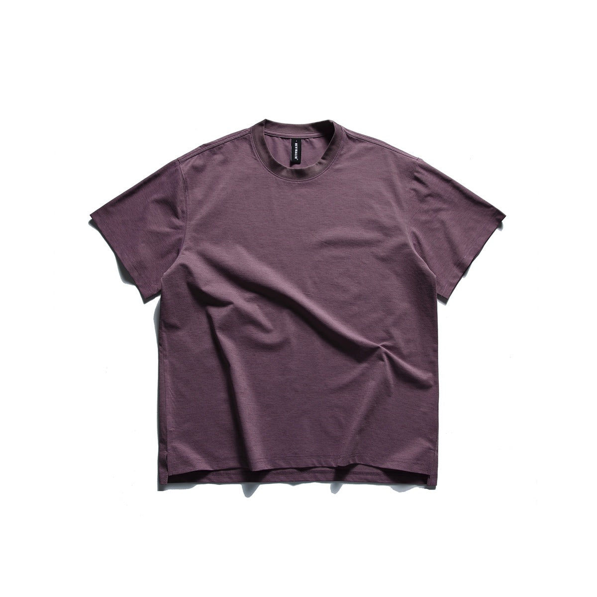 Taro purple short-sleeve crew neck T-shirt laid flat, front view, with side hem slits