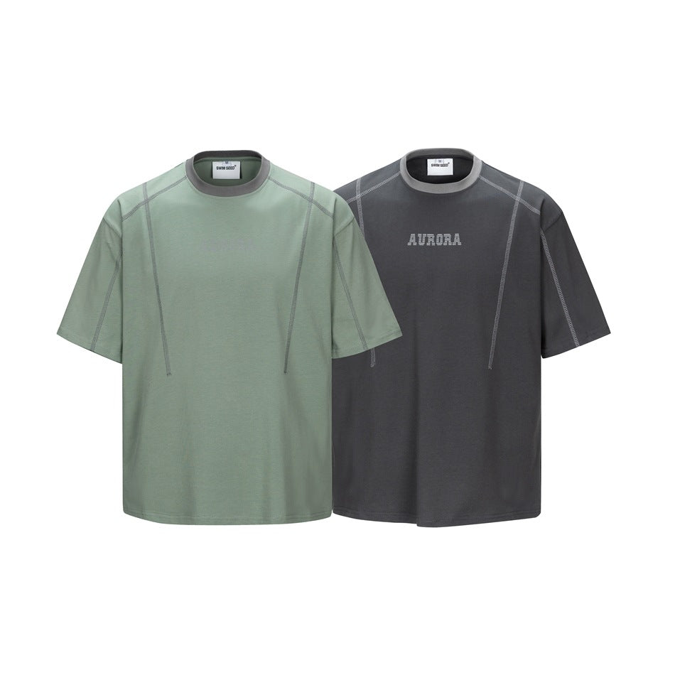Two short-sleeve crew-neck T-shirts shown from the front in sage green and charcoal, with contrast seams.