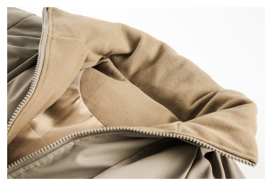 Open beige jacket showing its soft tan inner collar, lining, and zipper edge.