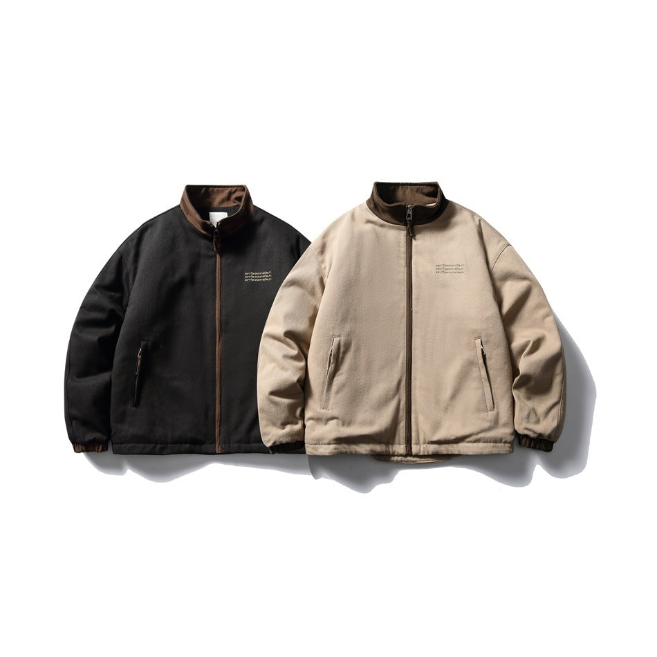 Two zip jackets displayed side by side: one black and one tan, both with dark collars and front pockets.