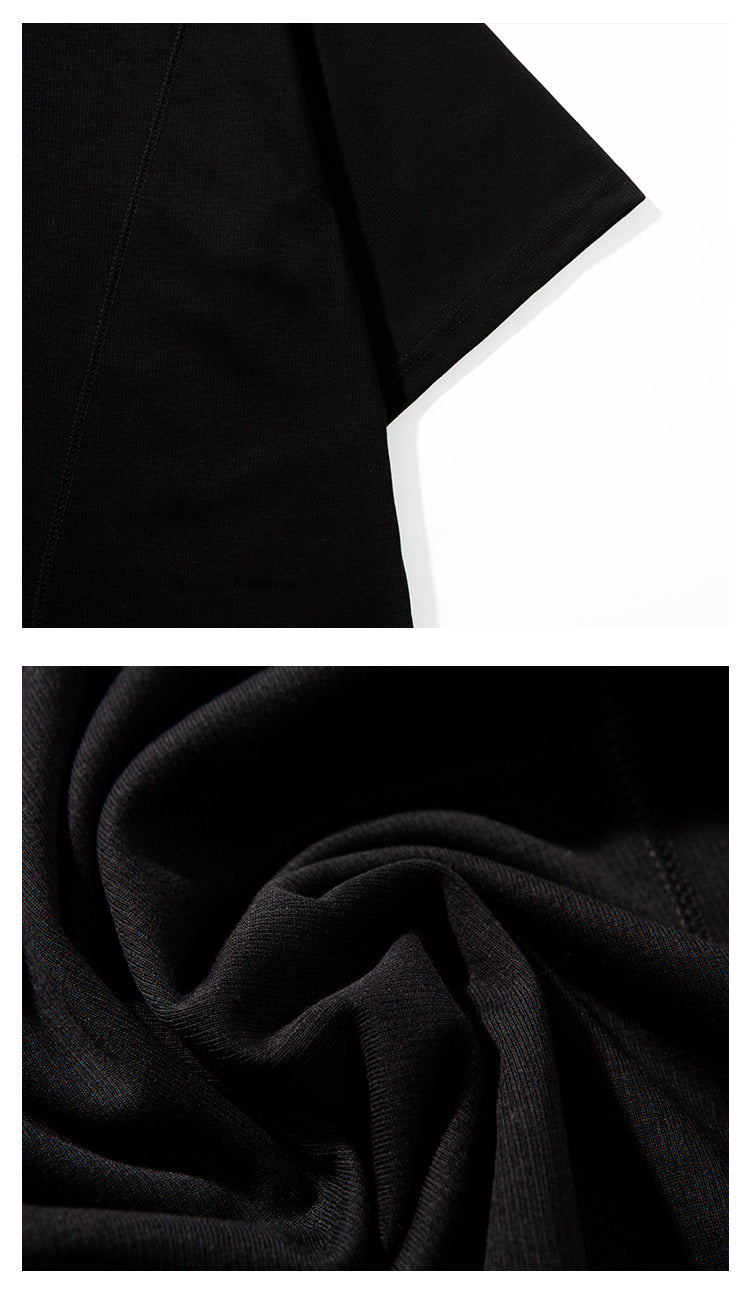Close-up of a black T-shirt sleeve and body seam, alongside a view of the draped fabric texture.
