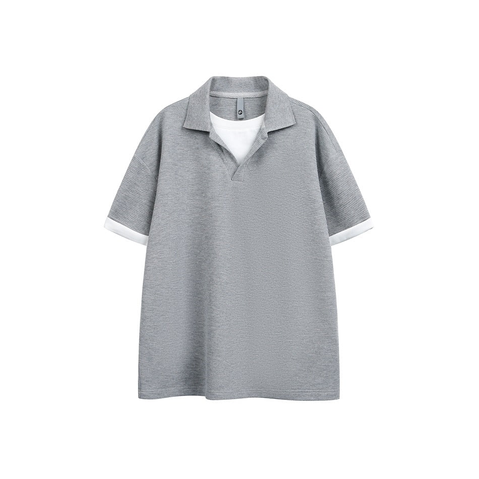 Heather gray short-sleeve textured polo-style top with white layered insert and white cuffs, flat front view