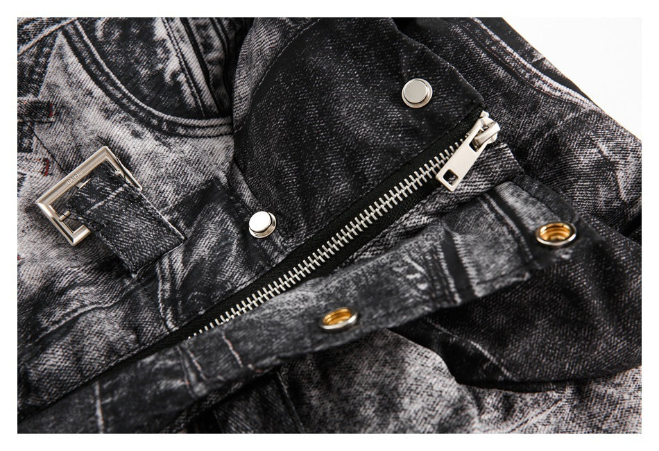 Close-up of a diagonal metal zipper, snaps, eyelets, and buckle on the printed jacket.