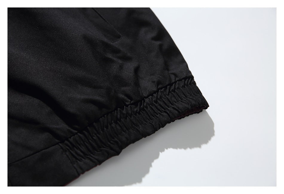 Close-up of a black garment with a gathered elastic edge.