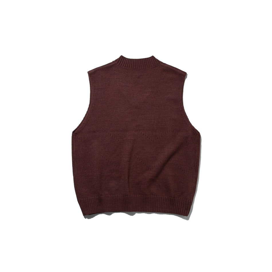 Back view of a burgundy sleeveless knit sweater vest with a ribbed neckline and hem.