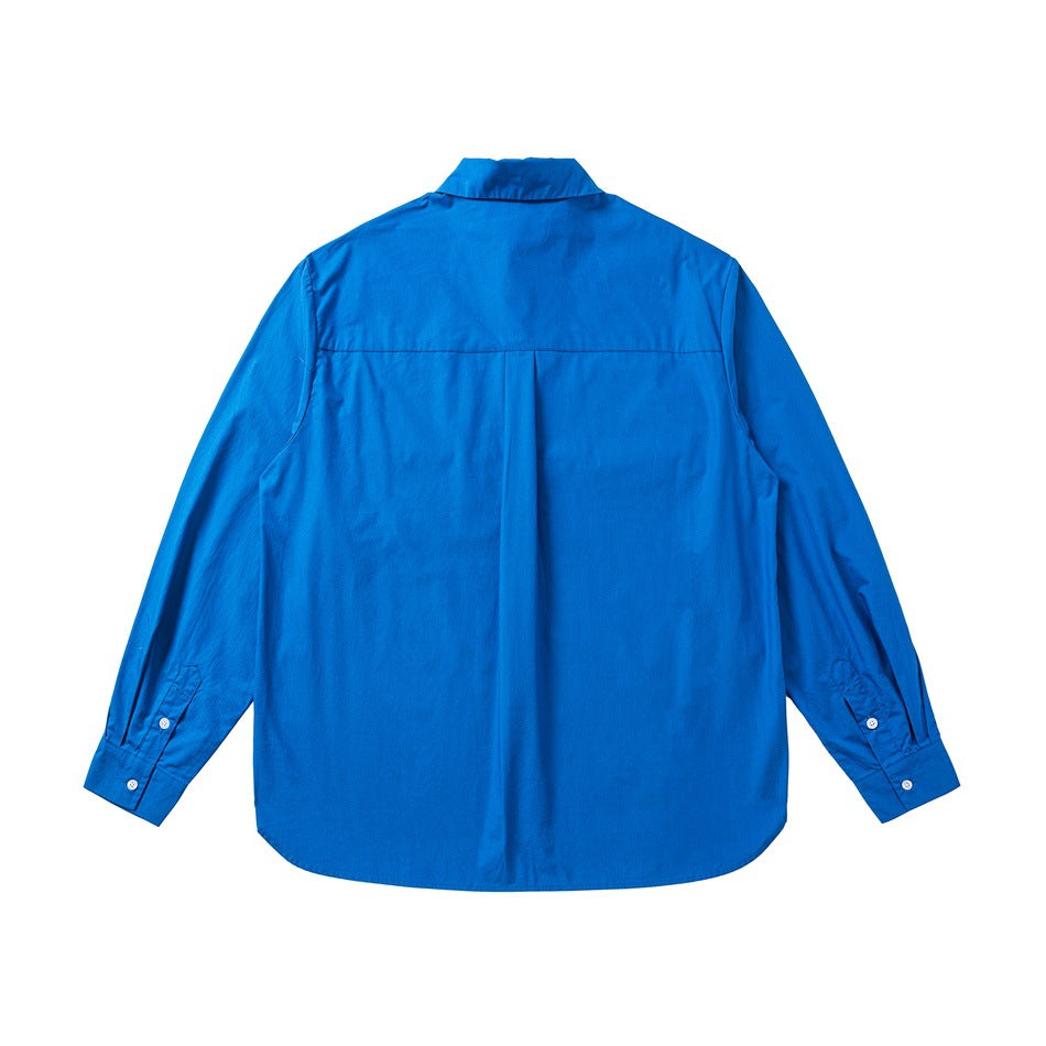 Flat-lay back view of a bright blue long-sleeve button-up shirt with a back yoke and center pleat.