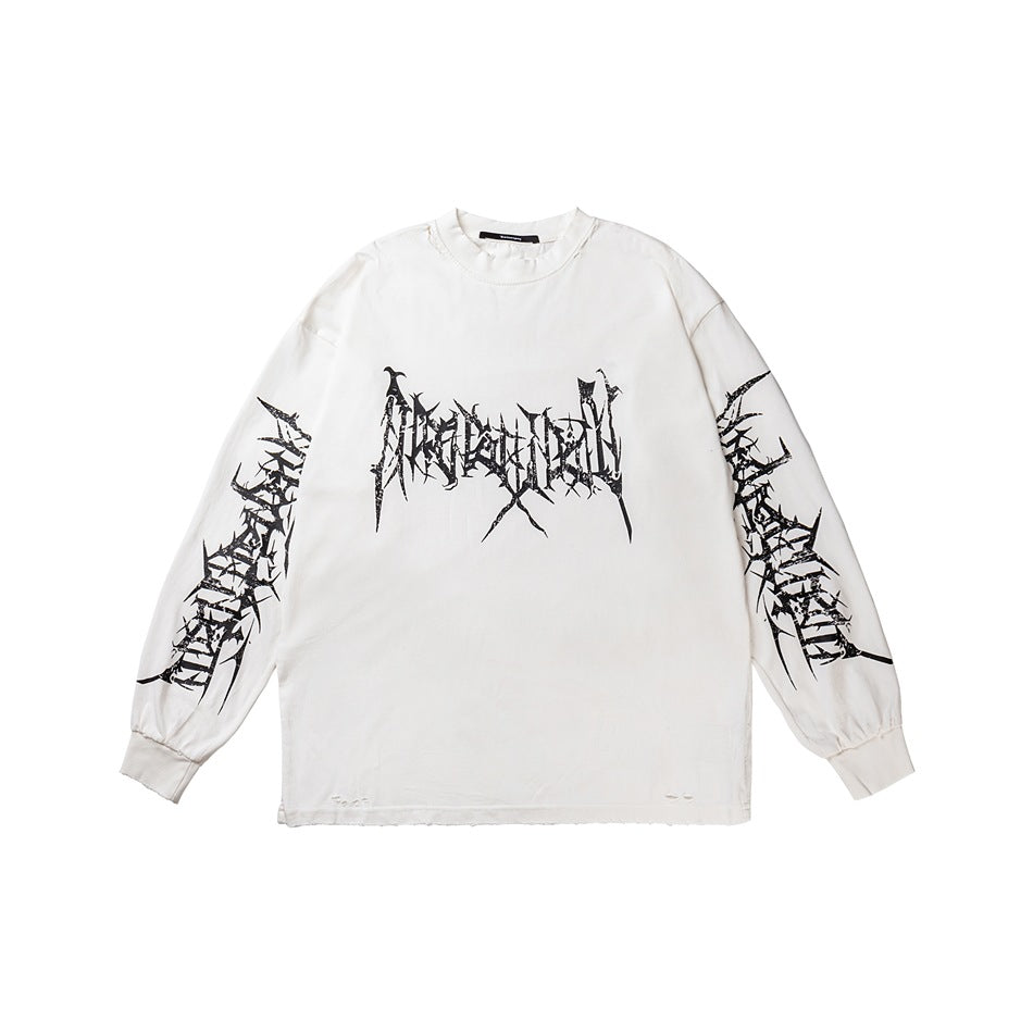 White long-sleeve crew neck top with black thorn-style gothic graphic on chest and sleeves, distressed hem, flat lay