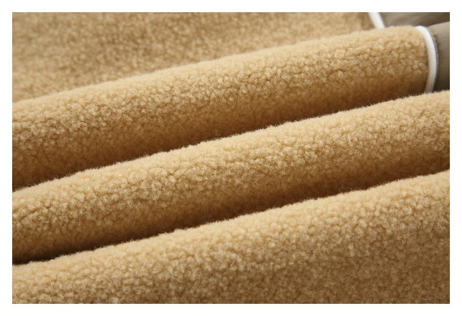 Close-up showing the textured tan plush surface in several folds.