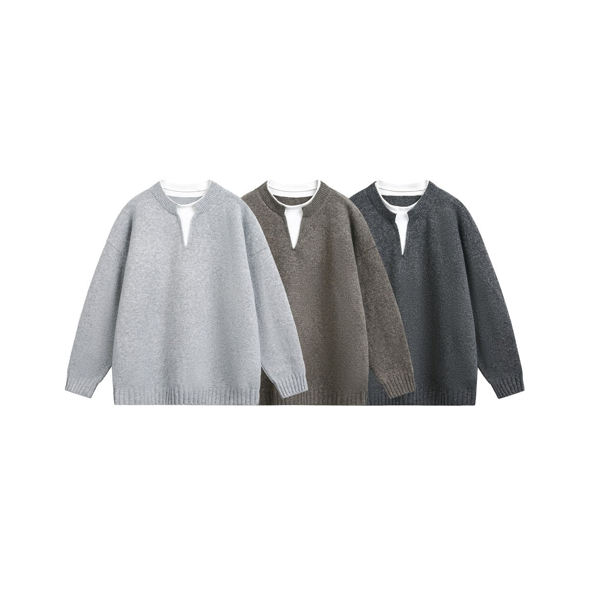 Three split-neck sweaters shown together in light gray, taupe, and charcoal, with ribbed cuffs and hems.