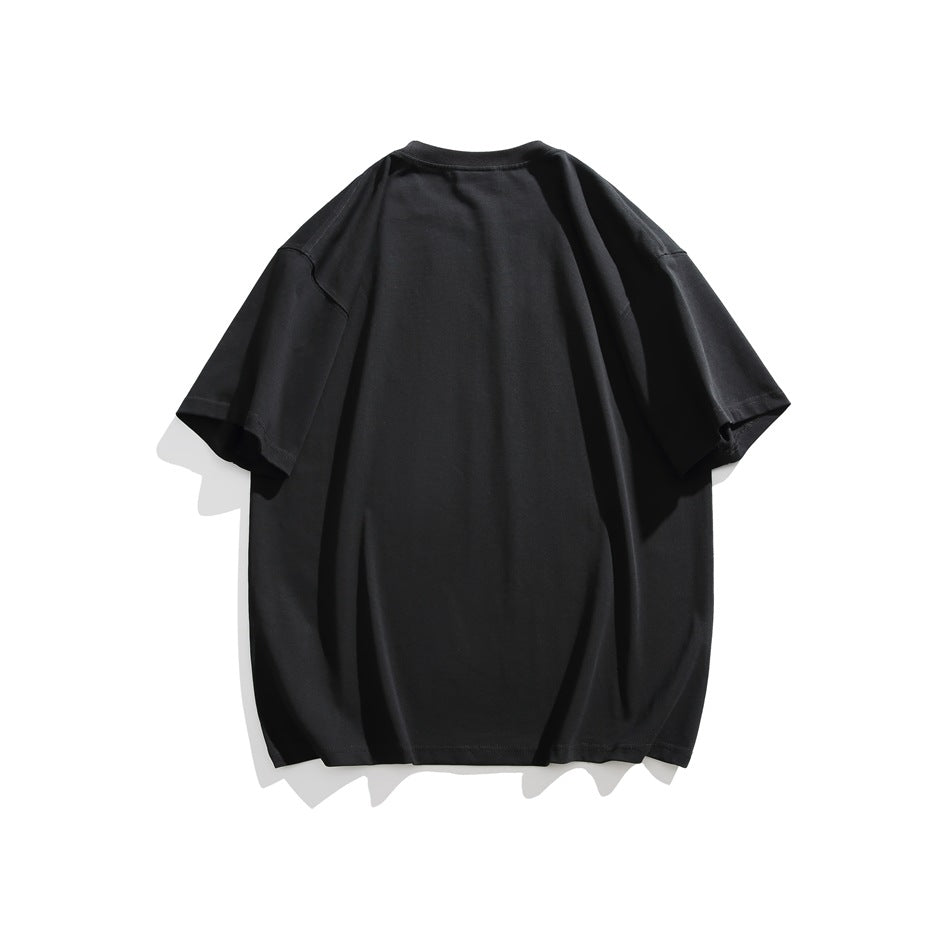 Back view of a plain oversized black short-sleeve T-shirt on a white background.