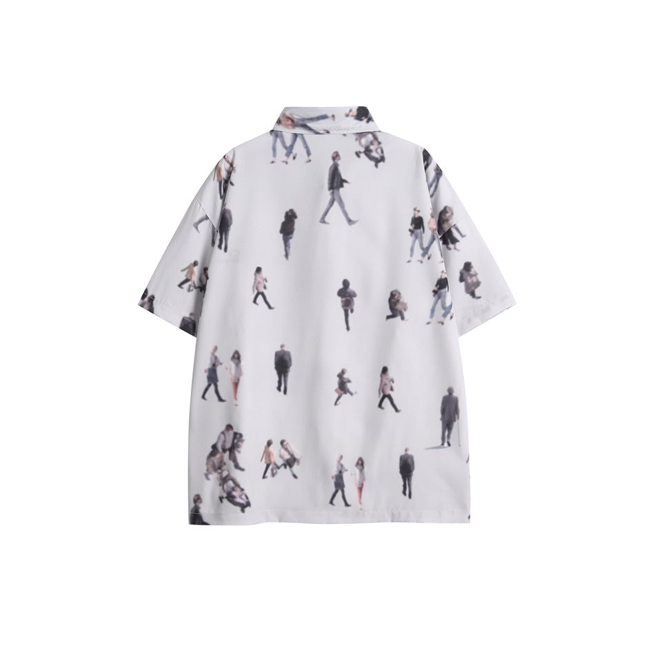 Back of a white short-sleeve collared shirt with an allover print of small people.