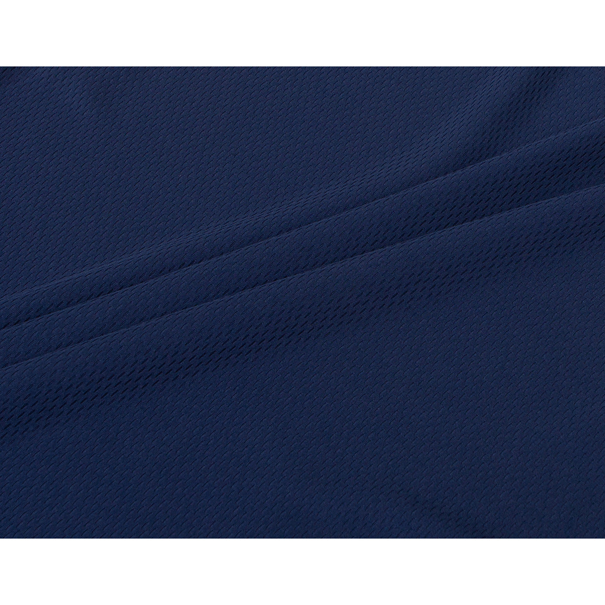 Extreme close-up of navy jersey fabric with a subtle repeating textured pattern.