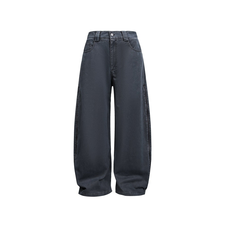 Front view of dark charcoal wide-leg jeans with belt loops, button closure and curved front pockets.