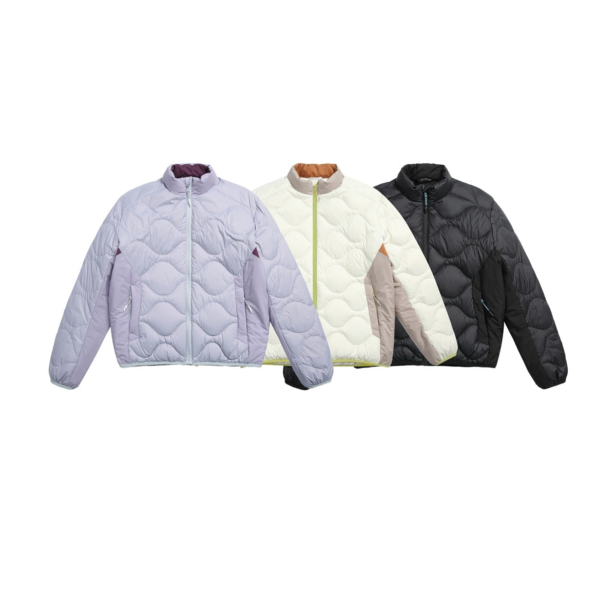 Three quilted zip jackets shown together in pale lavender, ivory, and black.