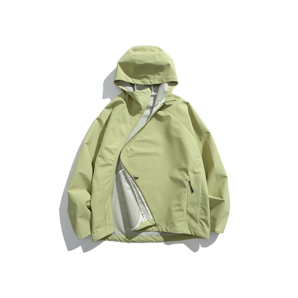 Light green hooded jacket with diagonal front zipper partly open, showing light gray inner facing and a zippered pocket