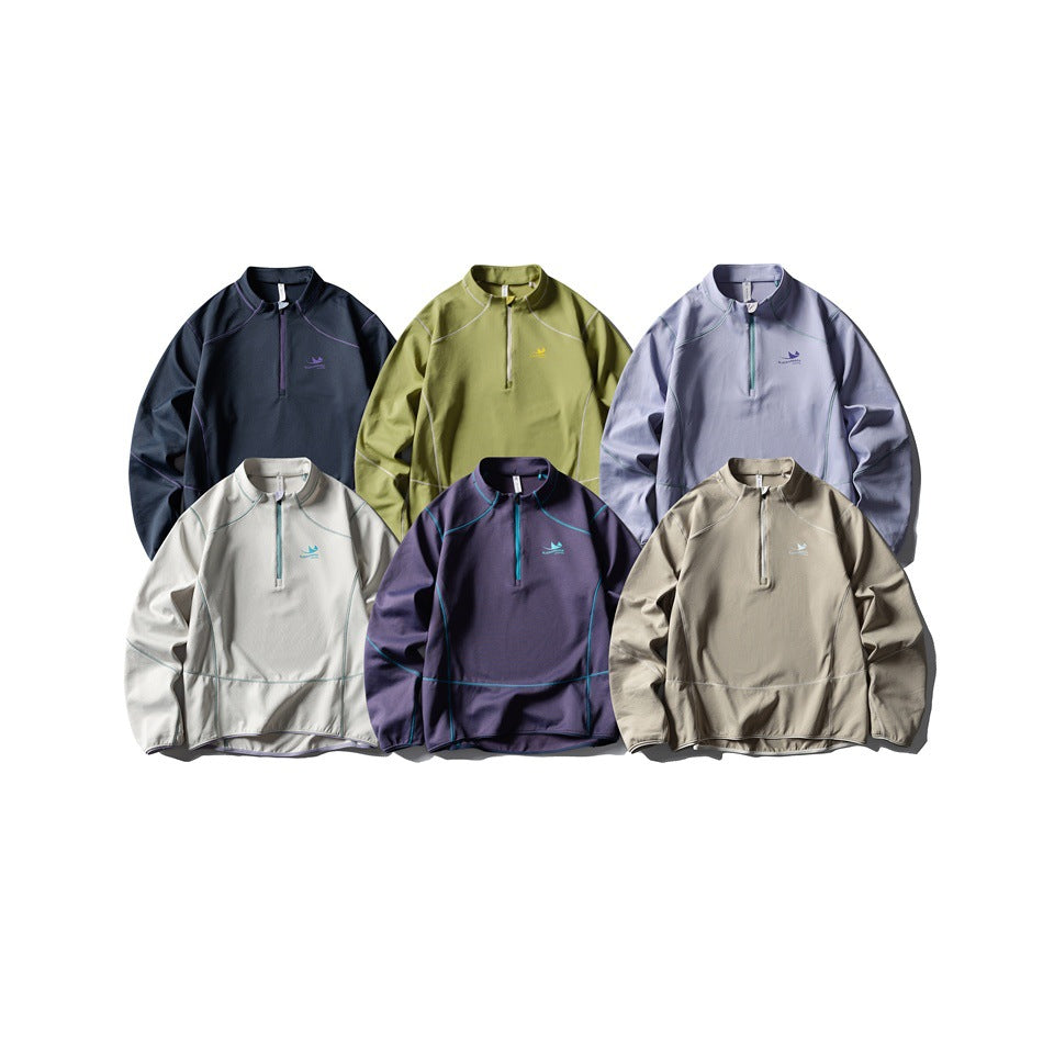 Six quarter-zip pullovers arranged in navy, olive, lavender, off-white, purple, and beige colorways.