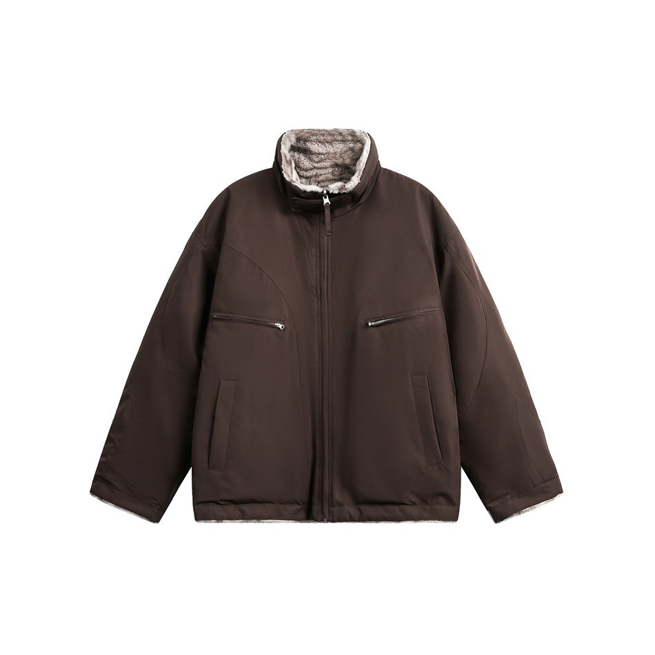Brown jacket front with high collar, center zipper, diagonal zip chest pockets and plush striped collar lining