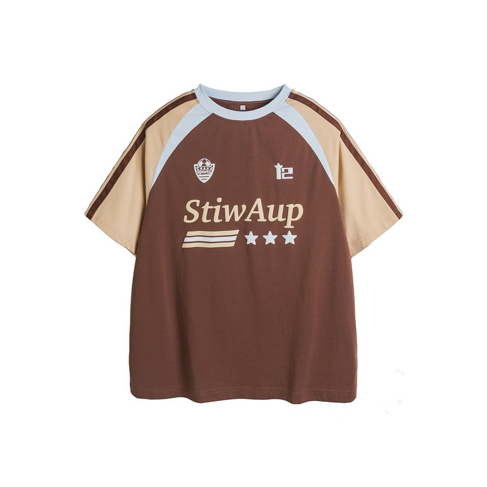 Brown raglan short-sleeve T-shirt with beige and light blue sleeves and a printed chest wordmark, stripes and stars