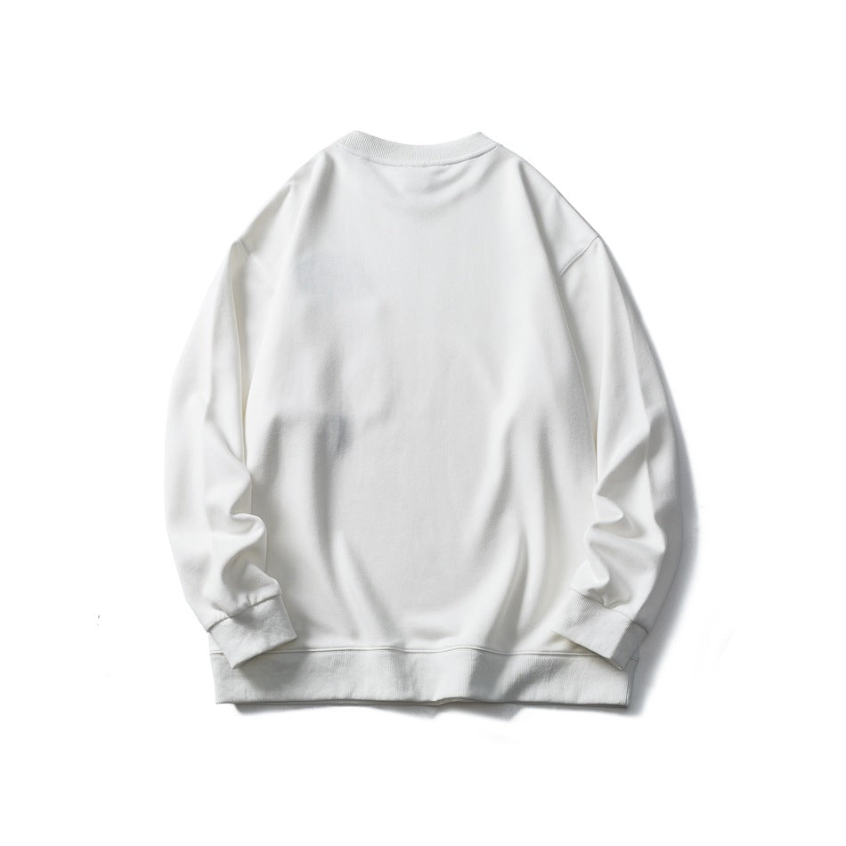 Back view of an ivory crewneck sweatshirt with long sleeves and ribbed cuffs and hem, shown flat on white.