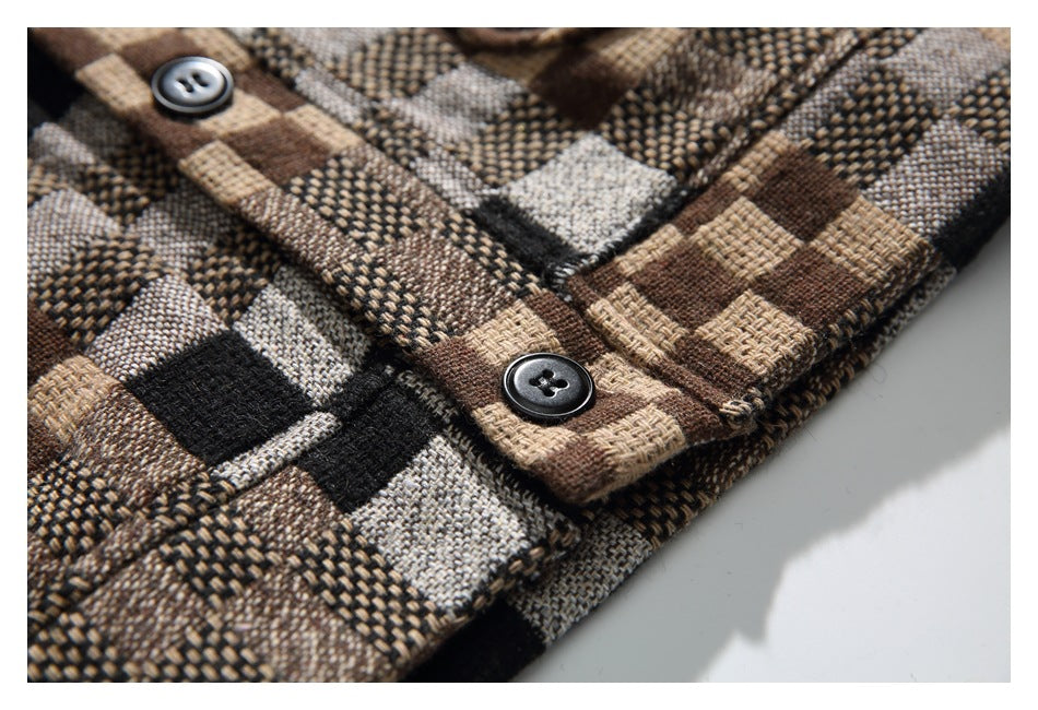 Close-up of the check shirt's dark buttons, placket, and textured brown, tan, gray, and black fabric.