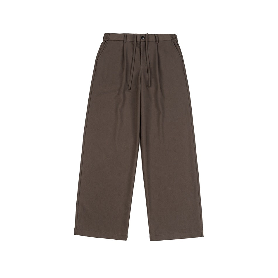 Brown wide-leg trousers flat lay, front view with pleats, button, drawstring and side pockets