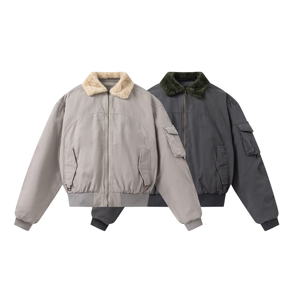 Two front-view bomber jackets with shearling collars, one light gray and one charcoal gray.