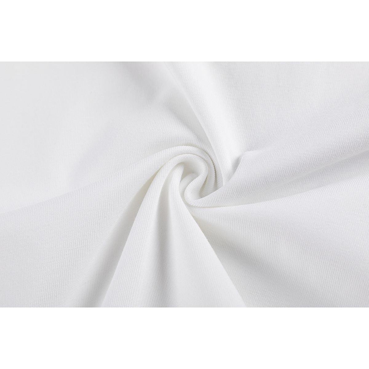 Close-up of white T-shirt fabric gathered into a swirl.